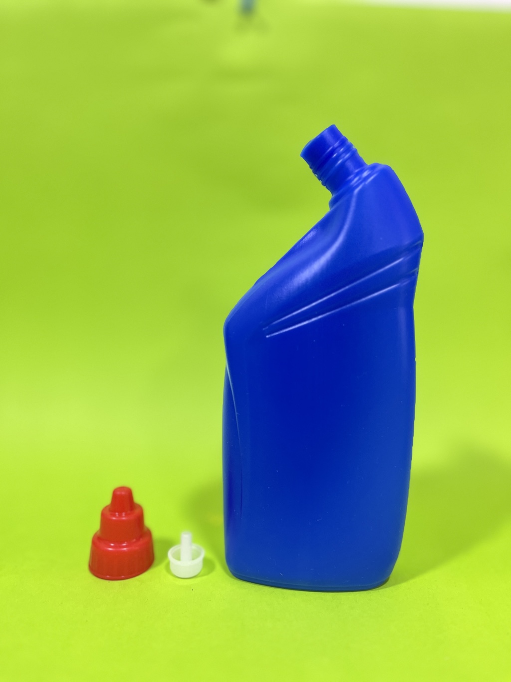 Toilet cleaner bottle 500ml. Blue colour, red cap and insert/plug